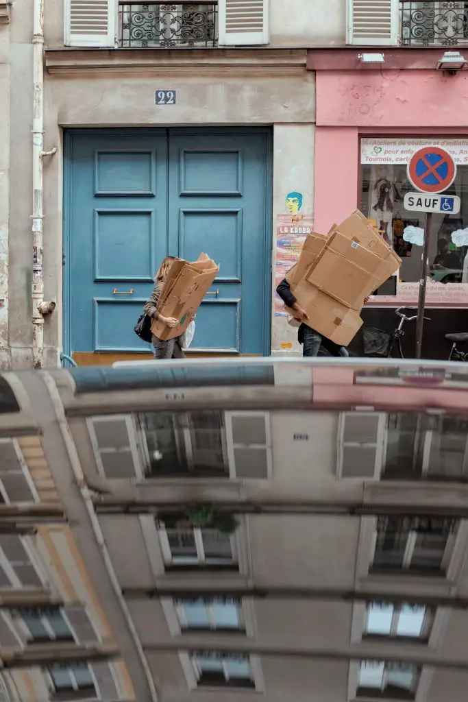 People Carrying Boxes