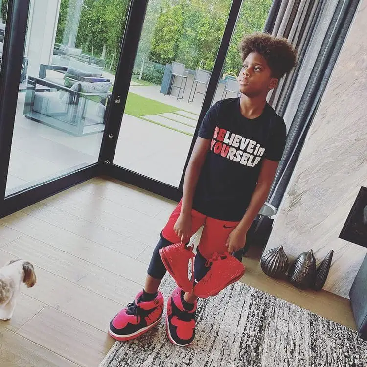 Chris Paul's Son Holding Sneakers