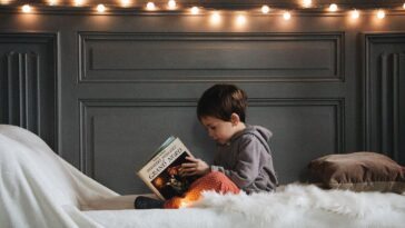 Kid Reading A Book