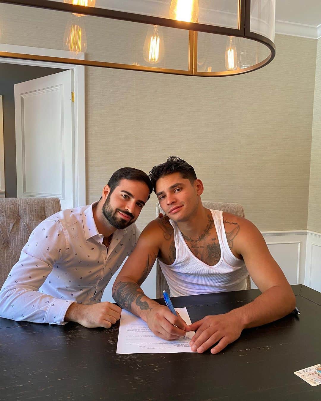 Ryan Garcia signing for the new house