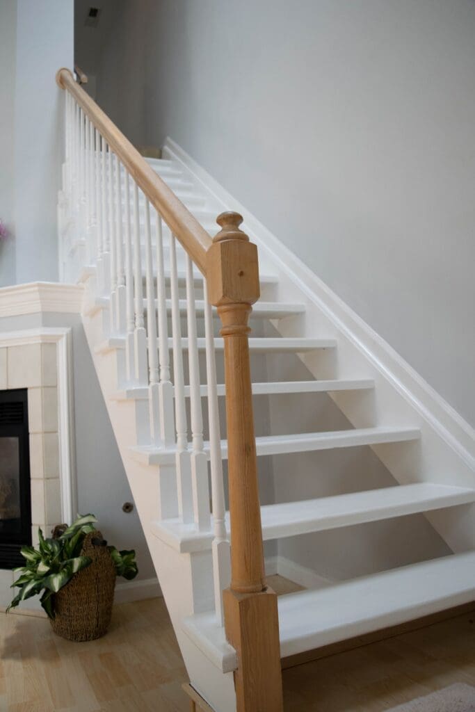 Stairs With A Wooden Handrail