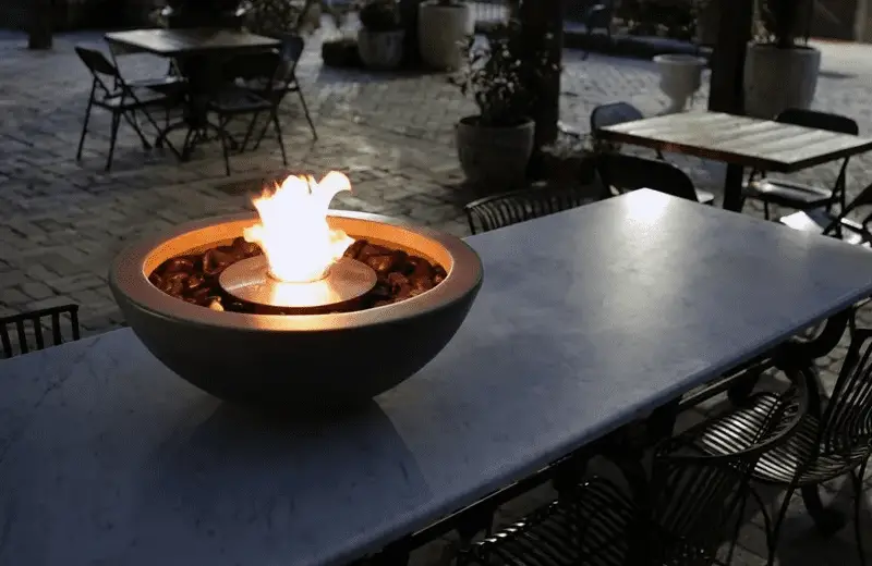 Table with a small ethanol fire pit