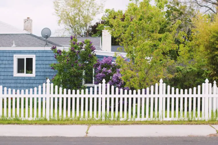 House With A White Fence