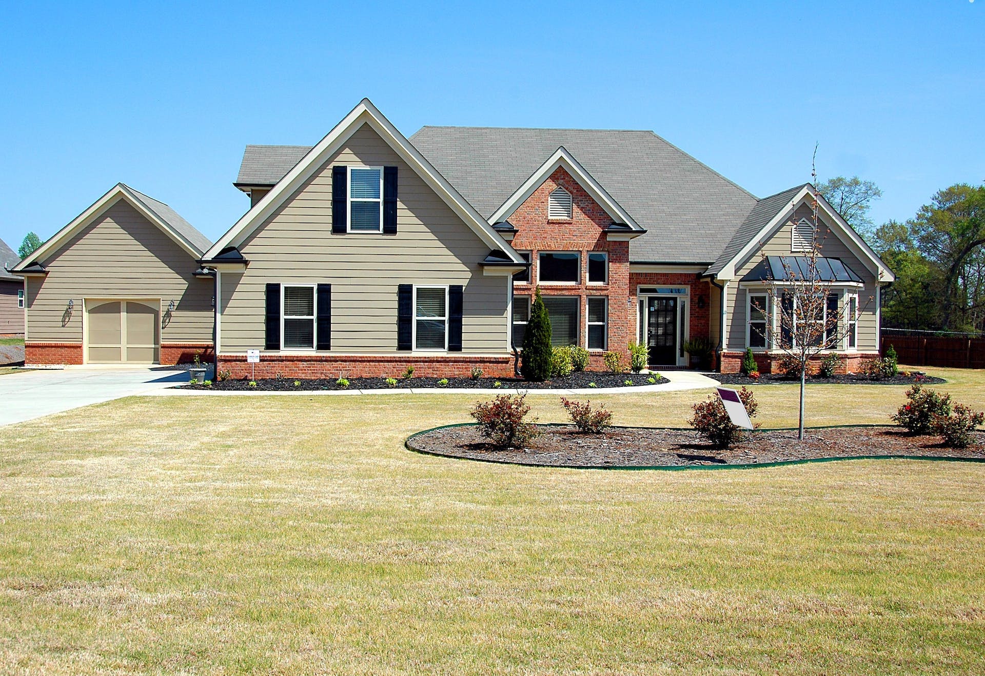 Large House With A Front Lawn