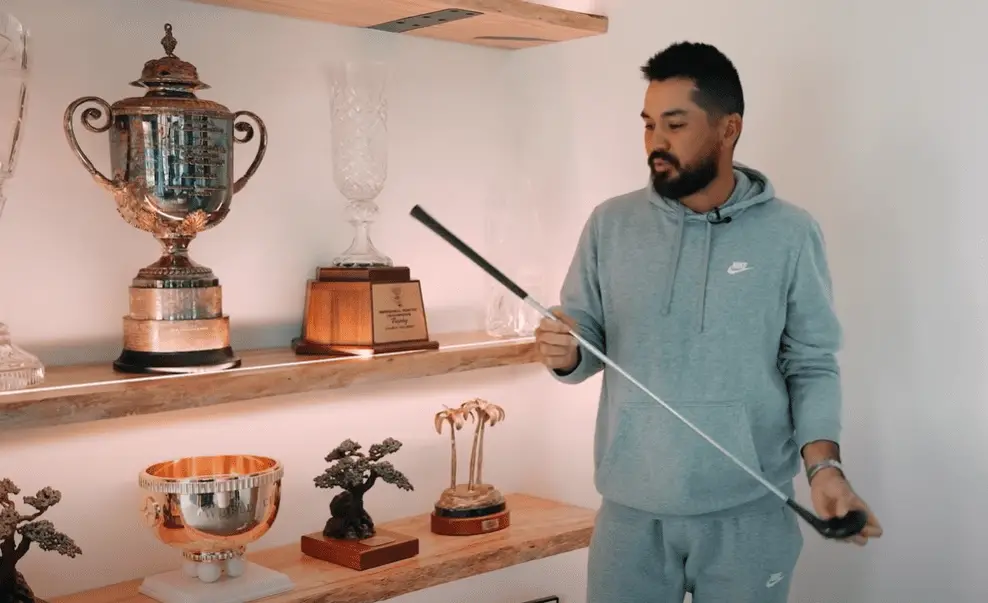 Jason Day's house shelves with sports items
