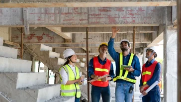 Engineers Checking A Building Construction