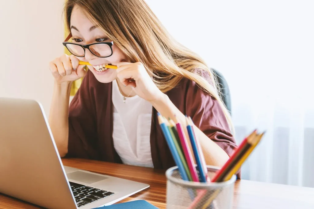 Student Biting On A Pencil